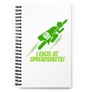 May include: A green spiral notebook with a green superhero figure flying with a green Excel spreadsheet logo on their chest. The text "I EXCEL AT SPREADSHEETS!" is below the figure.