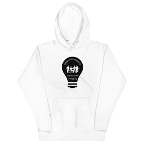May include: White hoodie with a black lightbulb graphic. The lightbulb has a group of people inside, including a person in a wheelchair. The text on the lightbulb reads "design with empathy create with integrity".