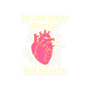Puede incluir: Una pegatina con una ilustración de corazón anatómico rosa y el texto "Break user stories not hearts" en amarillo.