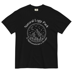 May include: Black t-shirt with a white graphic of a mountain range, moon, and stars inside a circle. The text "Natural Logs Park" and "A Mathematician's Dream" are written around the circle.