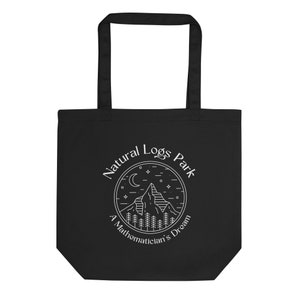 May include: Black tote bag with white graphic. The graphic features a mountain scene with trees, a crescent moon, and stars, encircled by the words "Natural Logs Park" and "A Mathematician's Dream."