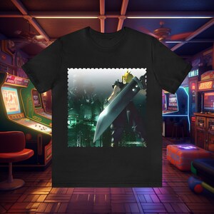 May include: Black t-shirt featuring a graphic of a character with a large sword, set against a futuristic cityscape. The character has spiky yellow hair and is holding a large sword. The design is framed with a decorative border.