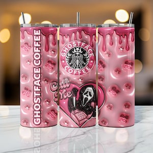 May include: A pink tumbler with a dripping design, featuring the text "Ghostface Coffee" and a heart-shaped graphic with the Ghostface mask and a phone. The tumbler has a straw and a lid.