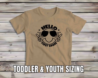 Kids Hello First Grade Tshirt Cute Shirt For Children Youth Back To School Shirt Happy Face Smiley Peace 1st Grade Boy's Girl's T-Shirt