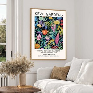 May include: A vintage-style poster advertising Kew Gardens, a Royal Botanic Gardens in London. The poster features a colorful illustration of various flowers and plants, with the text "Kew Gardens" and "Royal Botanic Gardens" in black lettering.