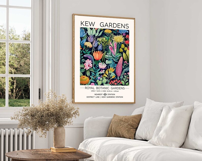 May include: A vintage-style poster advertising Kew Gardens, a Royal Botanic Gardens in London. The poster features a colorful illustration of various flowers and plants, with the text "Kew Gardens" and "Royal Botanic Gardens" in black lettering.