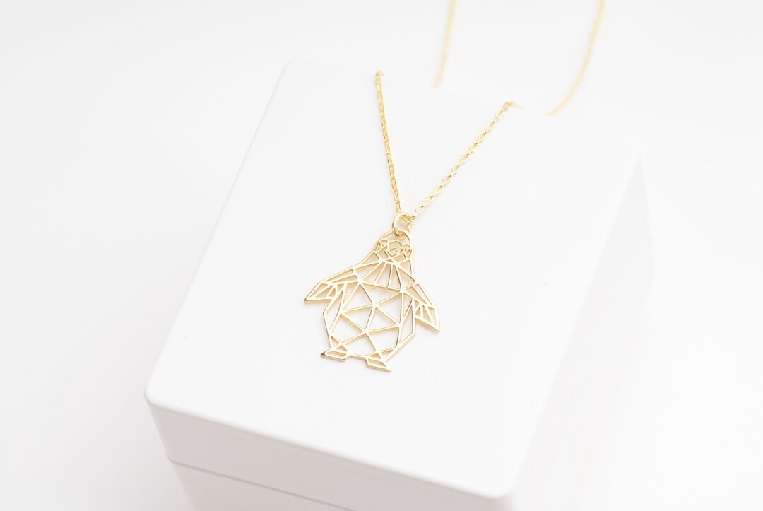 Collana con pinguino origami in oro