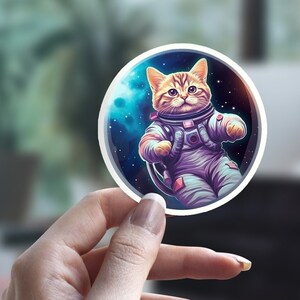 Etiqueta engomada del astronauta del gato, etiqueta engomada del gato espacial, etiqueta engomada linda del gato, etiqueta engomada de la persona del gato, etiqueta engomada del animal doméstico, etiqueta engomada del ordenador portátil, etiqueta engomada de la botella de agua
