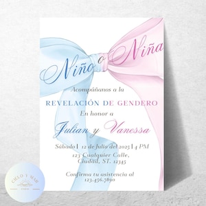 Peut inclure: Une invitation de révélation du sexe avec un design aquarelle. L'invitation présente un nœud de ruban bleu et rose avec les mots "Nino" et "Niña". Le texte invite les invités à une révélation du sexe en l'honneur de Julian et Vanessa.