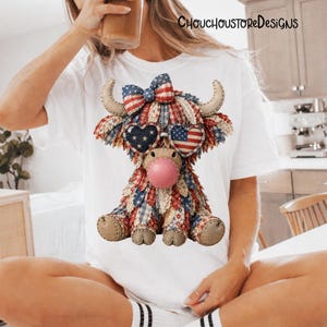 May include: White t-shirt featuring a patriotic Highland cow design. The cow has a bow, heart-shaped sunglasses, and a pink nose. The design incorporates red, white, and blue patterns and the American flag. The text "CHOUCHOUSTOREDESIGNS" is at the top.