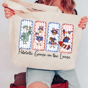 May include: Cream-colored tote bag featuring four cartoon geese dressed in patriotic attire. Each goose is in a rectangular frame with red, white, and blue stripes. The text "Patriotic Goose on the Loose" is printed below the geese.