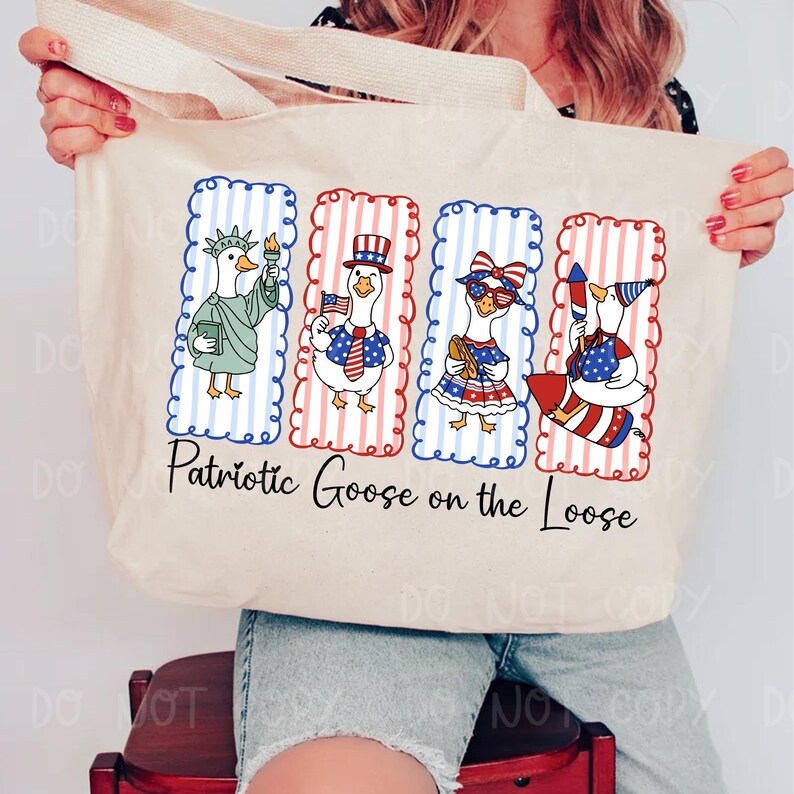May include: Cream-colored tote bag featuring four cartoon geese dressed in patriotic attire. Each goose is in a rectangular frame with red, white, and blue stripes. The text "Patriotic Goose on the Loose" is printed below the geese.