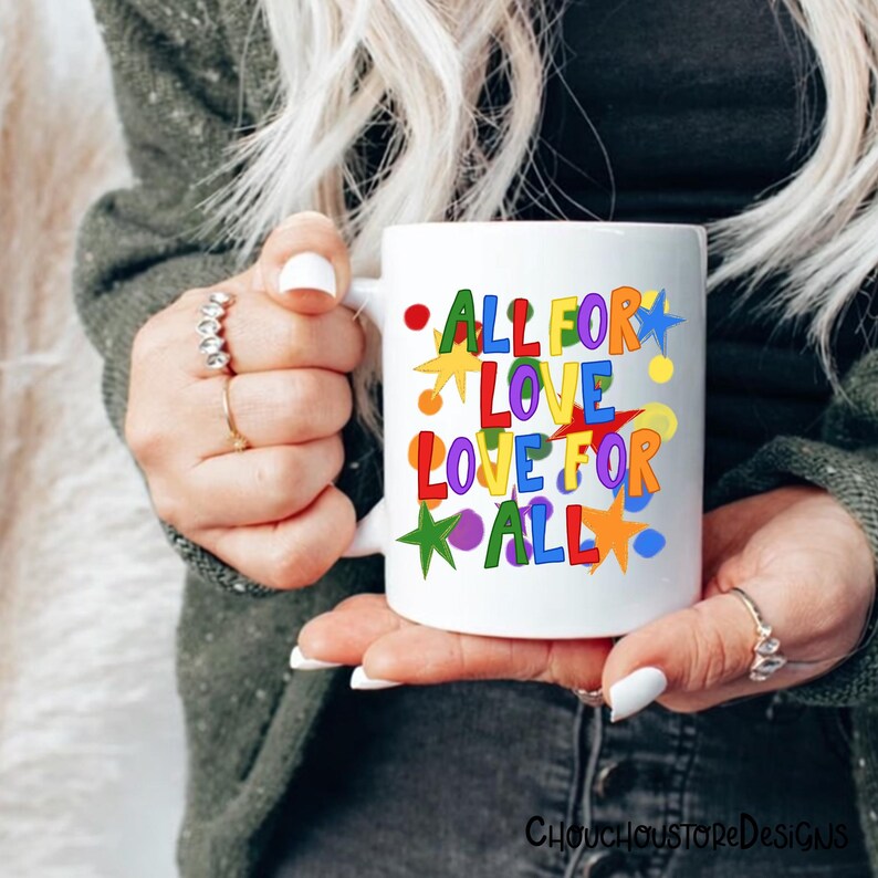 May include: White ceramic mug with the text "ALL FOR LOVE LOVE FOR ALL" in colorful, playful lettering. The design includes stars and circles in various colors. A cheerful and vibrant design for a coffee or tea mug.