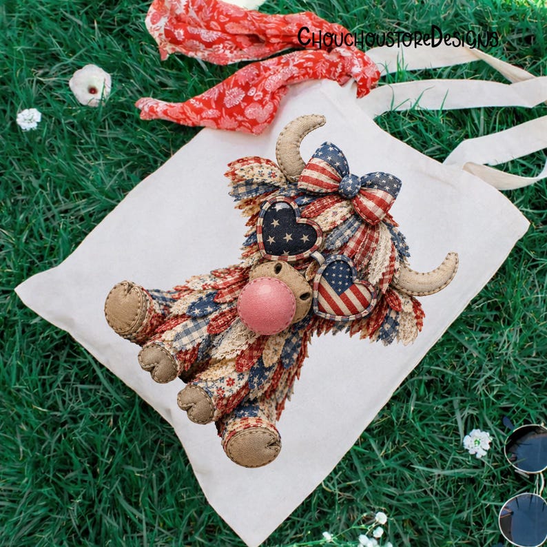 May include: A white tote bag featuring a Highland cow design with patriotic red, white, and blue fabric. The cow has a pink nose, heart-shaped accents, and a bow. The bag has white handles and the text "ChouchoustoreDesigns".
