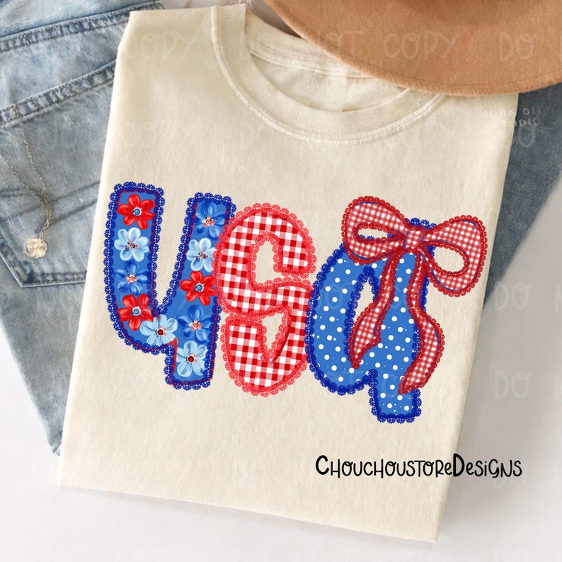 May include: Cream-colored t-shirt with the text "USA 4th" in red, white, and blue. The "U" is blue with floral accents, the "S" is red gingham, the "A" is blue with white polka dots, and the "4" has a red bow. The text "ChouchoustoreDesigns" is at the bottom.