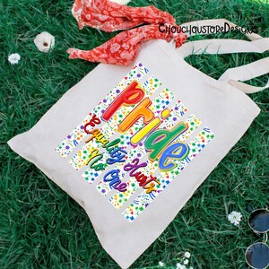 May include: A white tote bag with the words "Pride, Equality Hurts No One" in rainbow colors. The text is set against a background of colorful floral stripes. The bag has long white handles.