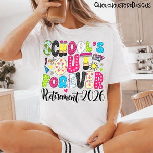 May include: A white ceramic mug with a black handle and the text "But First, Coffee" in a bold, black font. The mug is set against a blurred background, highlighting its clean design.