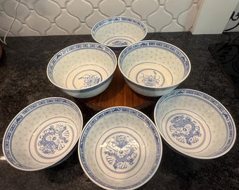 Vintage set of 6 Jingdezhen Chinese reverse rice eye pattern centered with blue dragon / floral pattern porcelain rice bowls