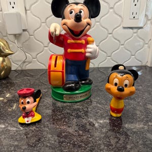 Vintage Mickey Mouse piggy bank, water squirt gun and bubble pipe
