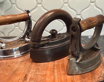 Antique sad irons - Sensible and Enterprise - wooden handles