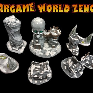 Puede incluir: Un conjunto de ocho edificios en ruinas y árboles en miniatura, pintados en un esquema de colores blanco y gris nieve. Los edificios están hechos de un material texturizado y tienen una variedad de formas y tamaños. Los árboles son verdes y están hechos de un material suave y flexible. El conjunto es perfecto para usar en juegos de guerra de mesa o como piezas decorativas.