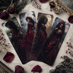 May include: Four rectangular bookmarks featuring illustrations of a person with dark curly hair wearing a long red and black gown. Each bookmark depicts a different pose against a dark, moonlit background with trees and roses, creating a cohesive set.