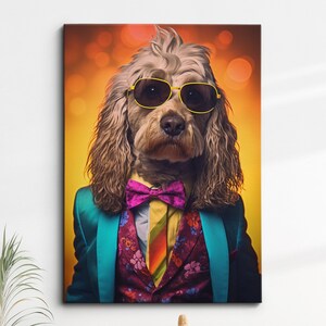 May include: A brown and white dog wearing a blue suit with a purple bow tie and yellow sunglasses. The dog is against a yellow background with blurred orange circles.