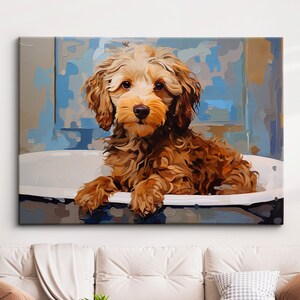 May include: A brown and white dog sits in a white bathtub. The dog has curly fur and looks at the camera. The background is a blue and white abstract painting.