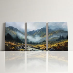 May include: A set of three landscape paintings showing a mountain scene with a river, trees, and mist. The artwork uses greens, yellows, and blues, creating a calm, natural view. The paintings are displayed on a white surface, reflecting the image.
