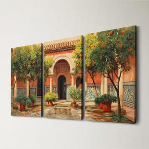 May include: A triptych canvas print depicting a courtyard scene. Orange trees laden with fruit flank a detailed archway. The walls are painted in shades of red and adorned with blue and white tilework. Potted plants add greenery.