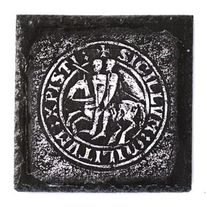 May include: Black and white seal with the text "SIGILLVM WILLIELMI" around the edge. The seal depicts two figures on horseback, with a cross above them.