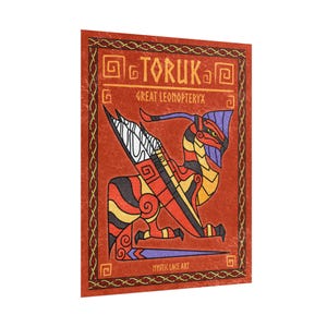 May include: A rectangular art print featuring a stylized illustration of a winged creature. The artwork is set against a reddish-brown background with the word "TORUK" at the top. The creature is depicted in red, yellow, black, and purple. The text "MYSTIC LAKE ART" is at the bottom.
