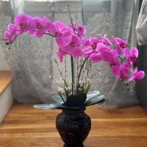 Extra large luxurious real touch orchid arrangement.