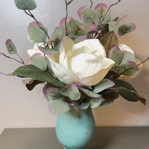 Luxurious real touch magnolia floral arrangement