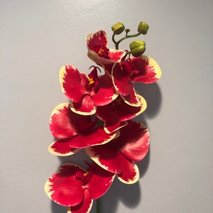 Real touch orchid with faux leaves
