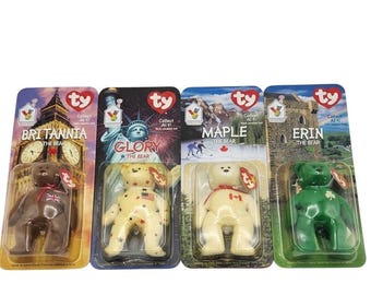 Set de 4 ositos Ty Teenie Beanie Babies vintage de McDonald's International de 1999, nuevos en su empaque original.