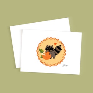 Petit raton laveur et l'orange Carte de vœux