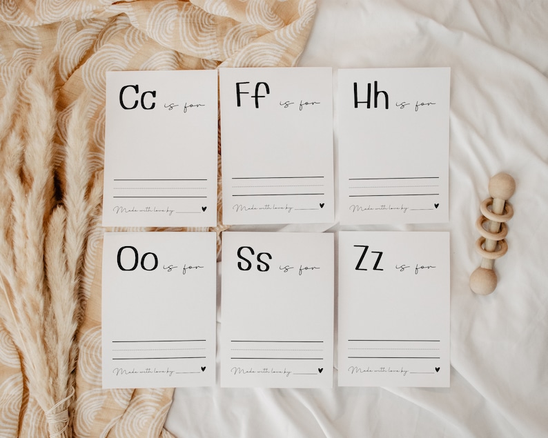 May include: Six white cards with black lettering. Each card features a letter of the alphabet, followed by "is for" and a blank line. The cards are arranged in two rows of three. The text on the cards reads: "Cc is for", "Ff is for", "Hh is for", "Oo is for", "Ss is for", and "Zz is for".