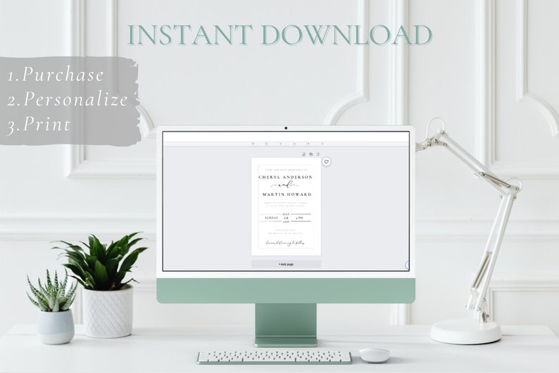 May include: A computer screen displaying a wedding invitation template with the text "Cheryl Anderson and Martin Howard" on a white background. The screen is on a white desk with a lamp and two potted plants.