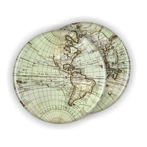May include: Two round coasters with a vintage world map design. The map is in shades of brown and green on a white background. The coasters are made of a glossy material.