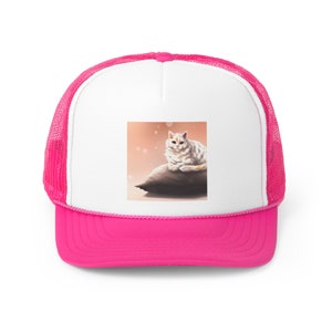 Cat sitting on a pillow Trucker Caps
