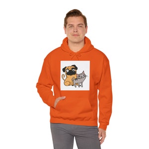 Un pug y un gato Sudadera con capucha Heavy Blend™ unisex