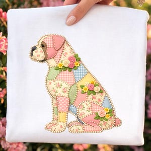 May include: A white square pillow featuring a patchwork design of a sitting dog. The dog is made of various pastel fabrics, including floral and gingham patterns, and is adorned with small floral embellishments.
