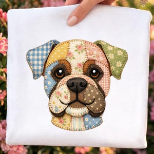 May include: White square fabric with a colorful patchwork design of a dog's face. The dog's face features patches of blue gingham, floral prints, and polka dots. The dog has brown eyes and a brown nose, with a stitched smile.