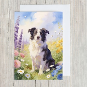 May include: A watercolor painting of a Border Collie dog sitting in a field of wildflowers. The dog has black and white fur and is surrounded by yellow, pink, purple, and white flowers. The background is a blue sky with clouds.