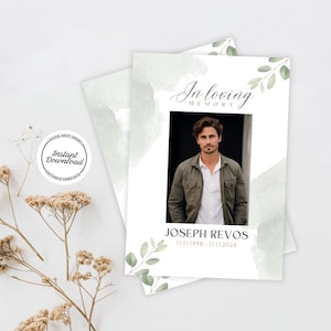 Peut inclure: Une carte blanche avec un fond aquarelle vert et une photo d'un homme. Le texte "In loving memory" est en haut de la carte, et le texte "Joseph Revos 11.11.1998 - 11.11.2024" est en bas.