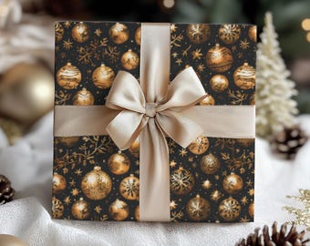 May include: A wrapped gift box with a black background and gold Christmas ornament pattern. The box is tied with a wide, light gold satin ribbon and bow. The overall theme is festive and holiday-related.