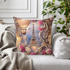 May include: A decorative throw pillow with a gold and white design featuring the Eiffel Tower, hot air balloons, and floral accents.