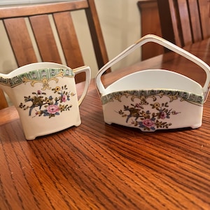 Vintage hand painted Noritake Japan sugar and creamer set.