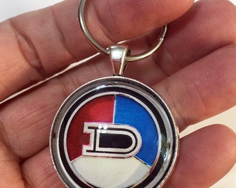 Vintage 1970-1973 Datsun 1200 Coupe Grille Emblem Logo Badge 1.2" Diameter Keychain